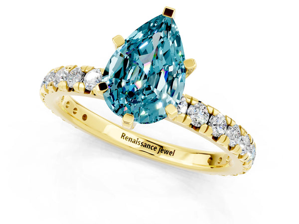 Yellow gold Pear Cut Blue Topaz Pavé Solitaire Ring with Round Band and Prong Setting