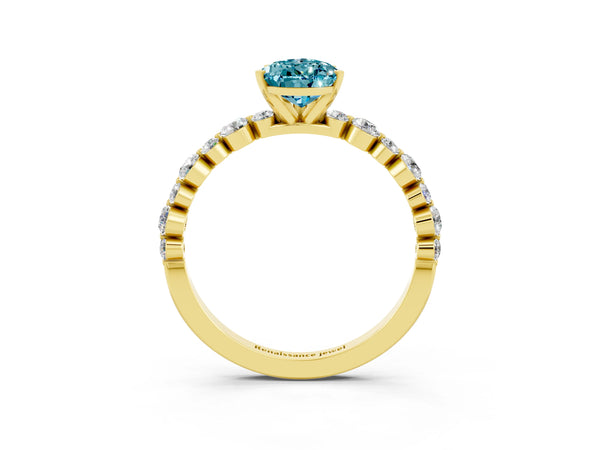 Yellow gold Pear Cut Blue Topaz Prong Set Engagement Ring with Pavé Band