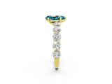 Yellow gold Pear Cut Blue Topaz Prong Setting with Side Stones on a Pave Band_2