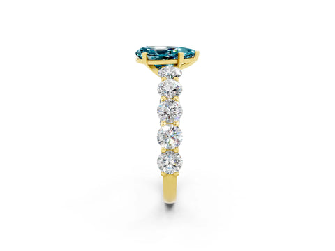 Yellow gold Pear Cut Blue Topaz Prong Setting with Side Stones on a Pave Band_2