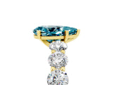 Yellow gold Pear Cut Blue Topaz Prong Setting with Side Stones on a Pave Band_5