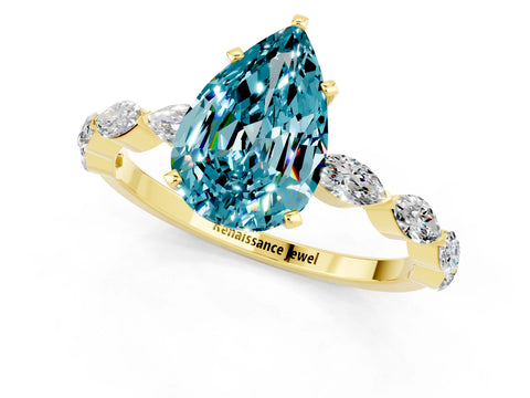 Yellow gold Pear Cut Blue Topaz Ring with Marquise Side Stones and Prong Setting_1