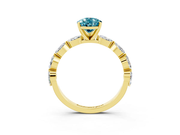 Yellow gold Pear Cut Blue Topaz Ring with Marquise Side Stones and Prong Setting