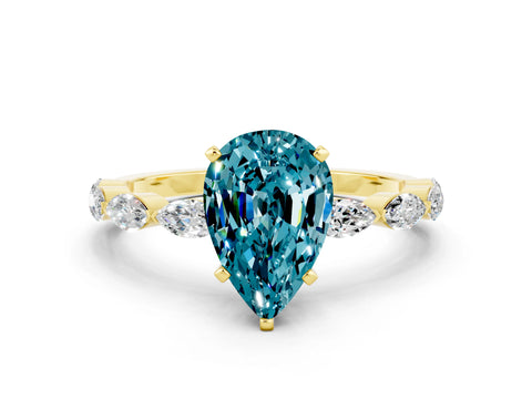 Yellow gold Pear Cut Blue Topaz Ring with Marquise Side Stones and Prong Setting