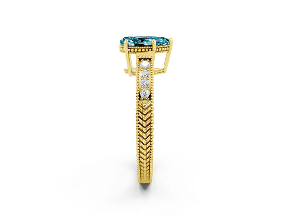 Yellow gold Pear Cut Blue Topaz Ring with Milgrain Pavé Band and Four-Prong Setting