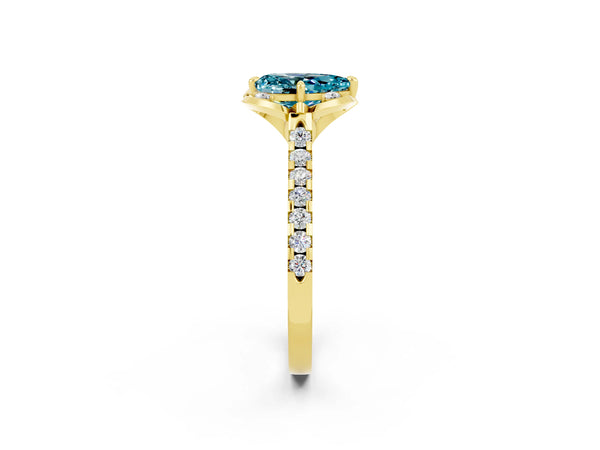 Yellow gold Pear Cut Blue Topaz Ring with Pavé Band and Floral Prong Setting