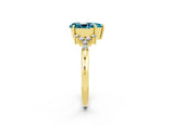 Yellow gold Pear Cut Blue Topaz Ring with Side Stones and Four-Prong Setting_38