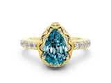 Yellow gold Pear Cut Blue Topaz Scalloped Halo Engagement Ring with Round Shared Prong Band_24