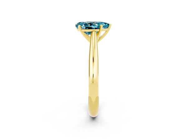 Yellow gold Pear Cut Blue Topaz Solitaire Engagement Ring with Cathedral Setting and Four-Prong Mount