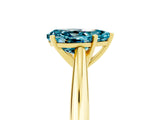 Yellow gold Pear Cut Blue Topaz Solitaire Engagement Ring with Cathedral Setting and Four-Prong Mount_29