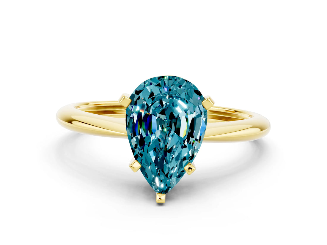 Yellow gold Pear Cut Blue Topaz Solitaire Engagement Ring with Classic Band and Four-Prong Setting_24