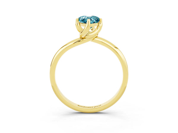 Yellow gold Pear Cut Blue Topaz Solitaire Engagement Ring with Four-Prong Setting and Classic Band