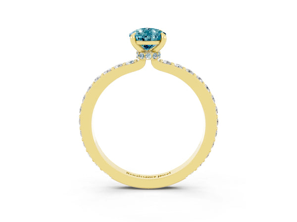 Yellow gold Pear Cut Blue Topaz Solitaire Engagement Ring with Pavé Band and Four-Prong Setting
