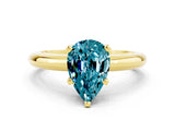 Yellow gold Pear Cut Blue Topaz Solitaire Engagement Ring with Round Band and Four-Prong Setting