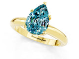 Yellow gold Pear Cut Blue Topaz Solitaire Engagement Ring with Round Band and Four-Prong Setting_1