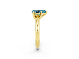 Yellow gold Pear Cut Blue Topaz Solitaire Engagement Ring with Round Band and Four-Prong Setting_2