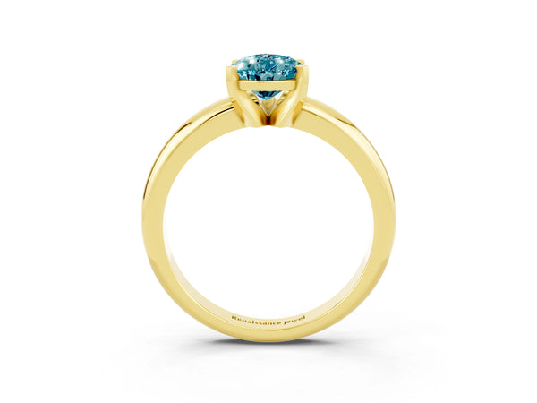 Yellow gold Pear Cut Blue Topaz Solitaire Engagement Ring with Round Band and Four-Prong Setting