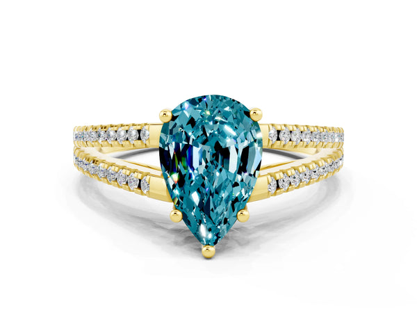 Yellow gold Pear Cut Blue Topaz Solitaire Engagement Ring with Split Shank Pavé Band