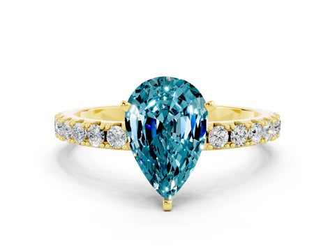 Yellow gold Pear Cut Blue Topaz Solitaire Pavé Band with Four-Prong Setting
