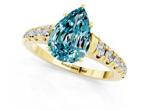 Yellow gold Pear Cut Blue Topaz Solitaire Ring with Cathedral Setting and Pavé Band_1