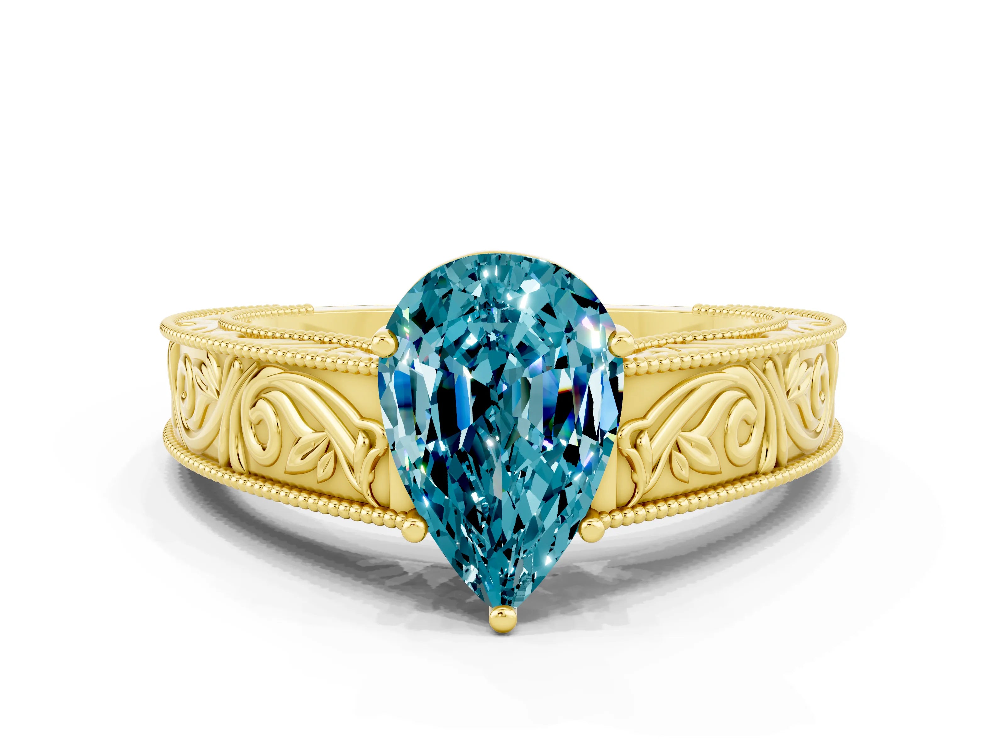 Yellow gold Pear Cut Blue Topaz Solitaire Ring with Engraved Band and Four-Prong Setting