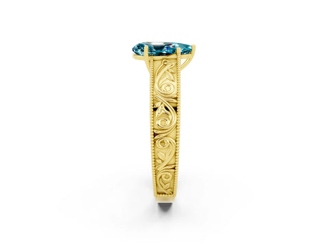 Yellow gold Pear Cut Blue Topaz Solitaire Ring with Engraved Band and Four-Prong Setting_2