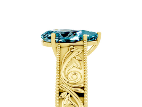 Yellow gold Pear Cut Blue Topaz Solitaire Ring with Engraved Band and Four-Prong Setting_5