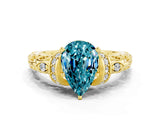 Yellow gold Pear Cut Blue Topaz Solitaire Ring with Filigree Band and Four-Prong Setting_24