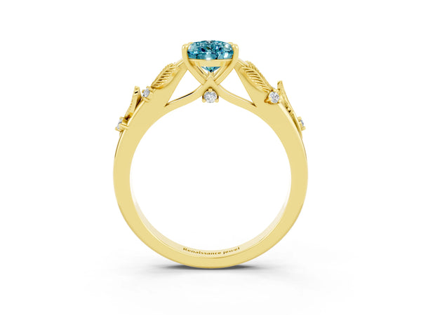 Yellow gold Pear Cut Blue Topaz Solitaire Ring with Leaf Motif Band and Four-Prong Setting