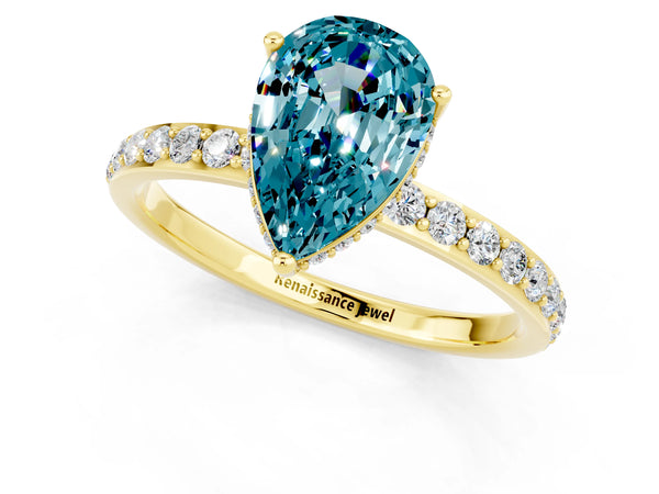 Yellow gold Pear Cut Blue Topaz Solitaire Ring with Pavé Band and Hidden Halo