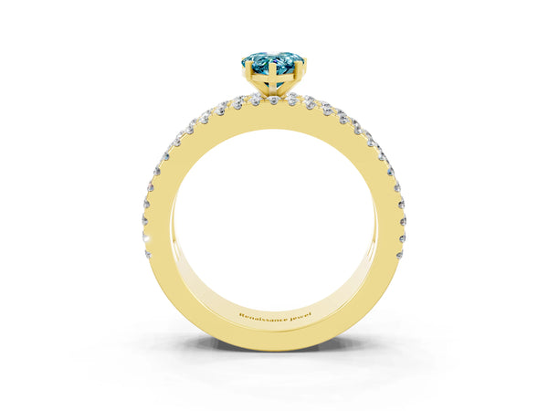 Yellow gold Pear Cut Blue Topaz Solitaire Ring with Pavé and Channel Set Band