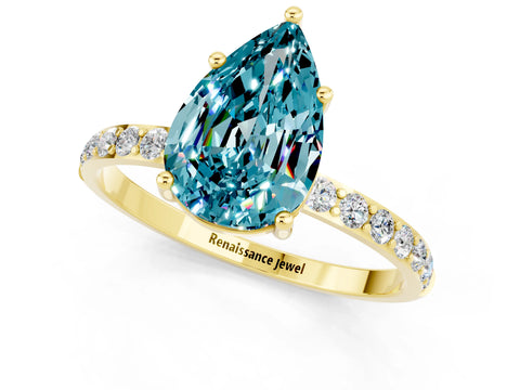 Yellow gold Pear Cut Blue Topaz Solitaire Ring with Pave Band and Four Prong Setting_1