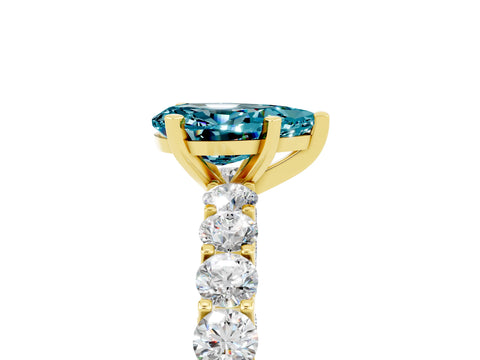 Yellow gold Pear Cut Blue Topaz Solitaire Ring with Shared Prong Pavé Band and Four-Prong Setting_5