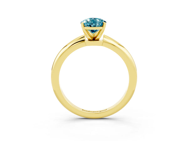 Yellow gold Pear Cut Blue Topaz Solitaire Ring with Six-Prong Setting and Classic Band