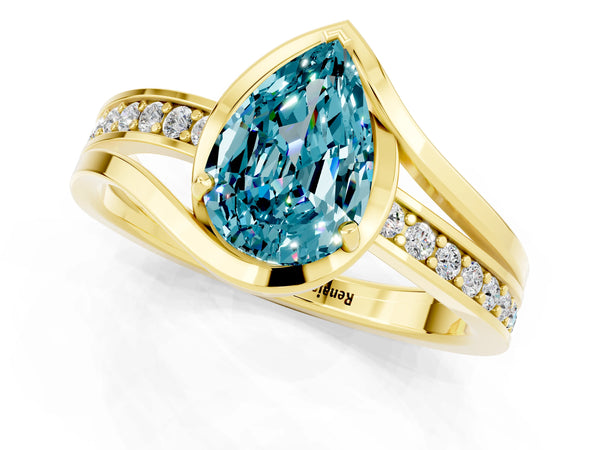 Yellow gold Pear Cut Blue Topaz Solitaire Ring with Split Shank and Prong Setting