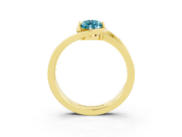 Yellow gold Pear Cut Blue Topaz Solitaire Ring with Split Shank and Prong Setting