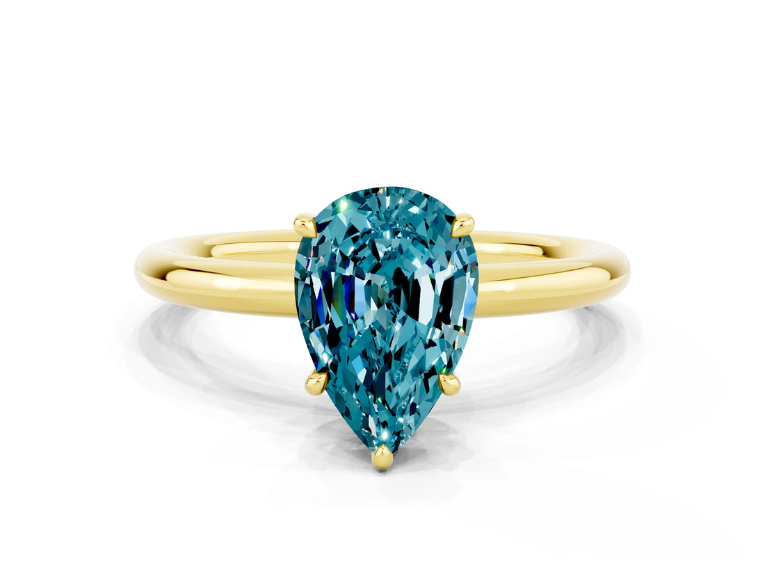 Yellow gold Pear Cut Blue Topaz Solitaire Ring with Thin Band and Four-Prong Setting_12