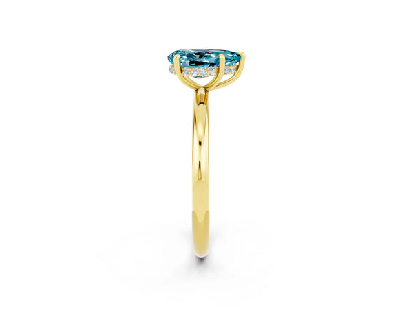 Yellow gold Pear Cut Blue Topaz Solitaire Ring with Thin Band and Four-Prong Setting