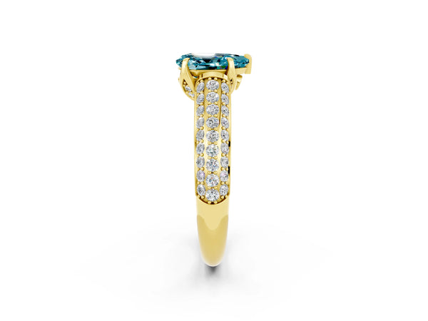 Yellow gold Pear Cut Blue Topaz Solitaire Ring with Three-Row Pavé Band and Four-Prong Setting