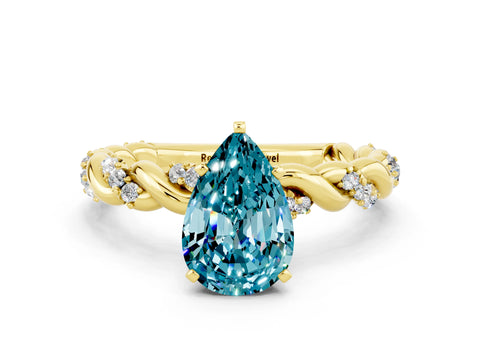Yellow gold Pear Cut Blue Topaz Solitaire Ring with Twisted Band and Pavé Accents