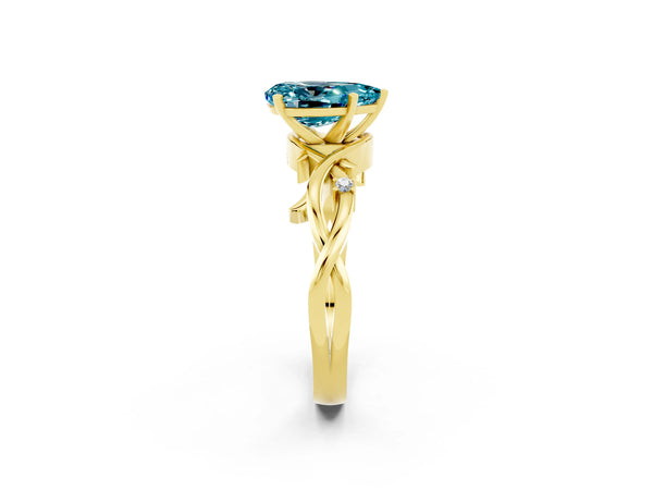 Yellow gold Pear Cut Blue Topaz Solitaire Ring with Twisted Band and Prong Setting