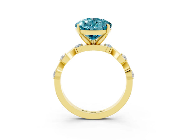 Yellow gold Pear Cut Blue Topaz Solitaire Twisted Band with Round  Accents and Prong Setting