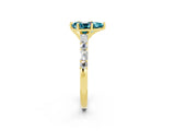 Yellow gold Pear Cut Blue Topaz Solitaire with Side Baguettes and Channel Set Band_2
