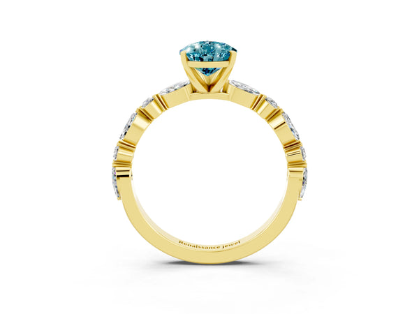 Yellow gold Pear Cut Blue Topaz Ring with Marquise and Round  Side Stones and Four-Prong Setting