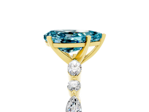Yellow gold Pear Cut Blue Topaz Solitaire with Side Stones on a Pavé Band and Four-Prong Setting_5