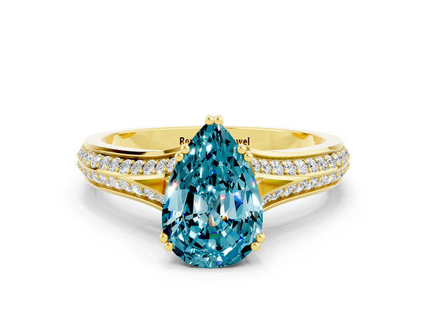 Yellow gold Pear Cut Blue Topaz Split Shank Engagement Ring with Pavé Band