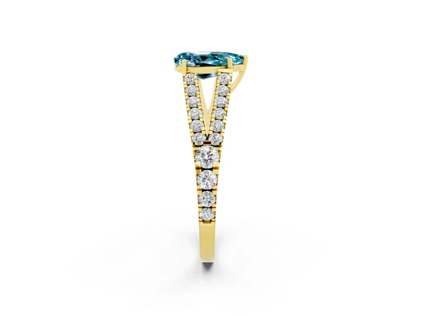 Yellow gold Pear Cut Blue Topaz Split Shank Pavé Engagement Ring with Four-Prong Setting
