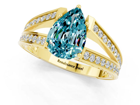 Yellow gold Pear Cut Blue Topaz Split Shank Ring with Pavé Band and Four-Prong Setting_1