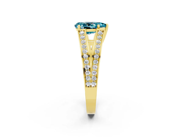 Yellow gold Pear Cut Blue Topaz Split Shank Ring with Pavé Band and Four-Prong Setting