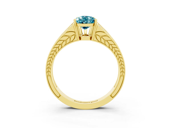 Yellow gold Pear Cut Blue Topaz Split Shank Ring with Pavé Band and Four-Prong Setting
